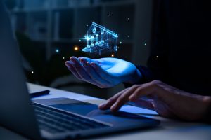 Hand of man holding hologram of bank icon, blockchain digital currency technology and DeFi virtual bank concept.
